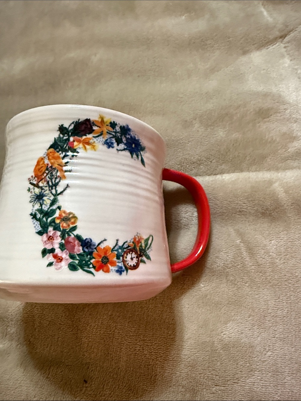 Anthropologie White Ceramic Mug with Floral Wreath and Red Handle